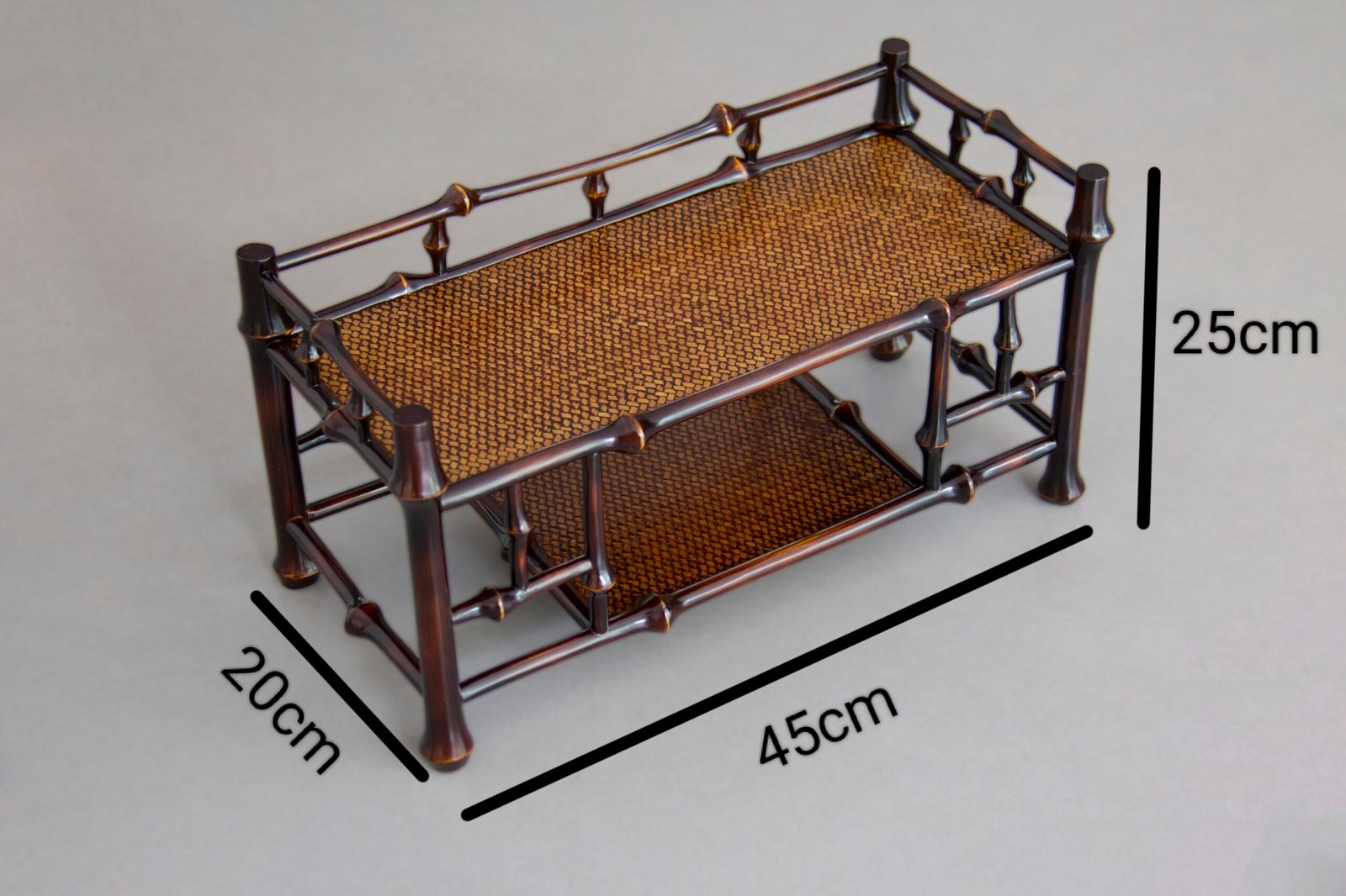 Double-layer Qiongzhu bamboo tea cup rack with intricate woven shelf design, measuring 45cm by 20cm by 25cm, suitable for tea set storage and display.